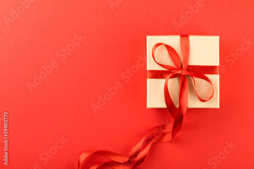 Gift Box Bow Red Background. Present on holiday