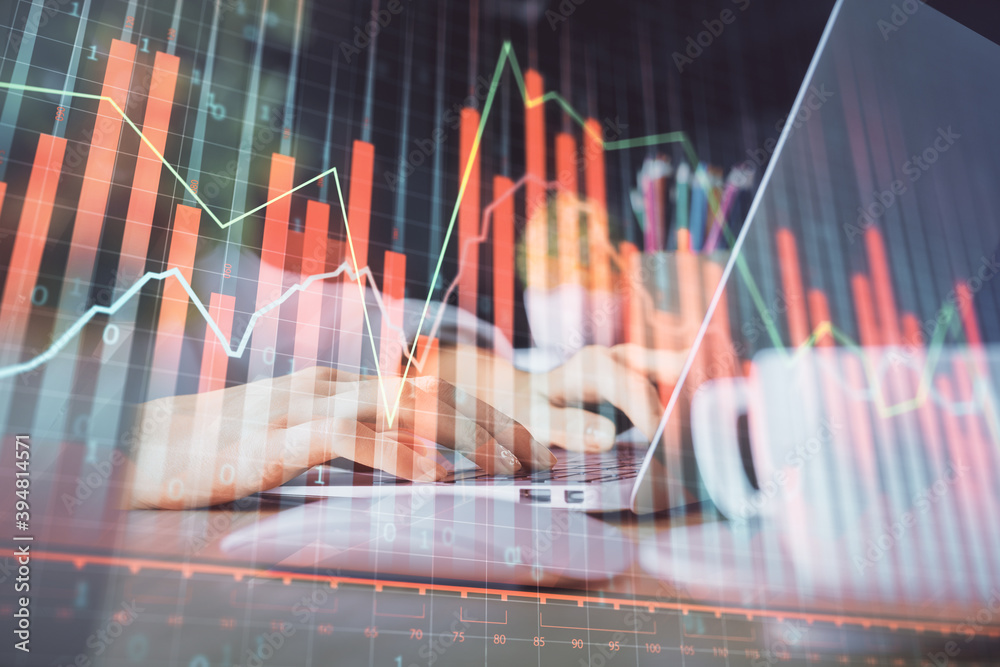 Double exposure of woman hands typing on computer and forex chart hologram drawing. Stock market invest concept.