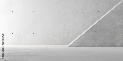 Abstract empty, modern concrete room with indirect lighting and diagonal wall lit from left - industrial interior background template