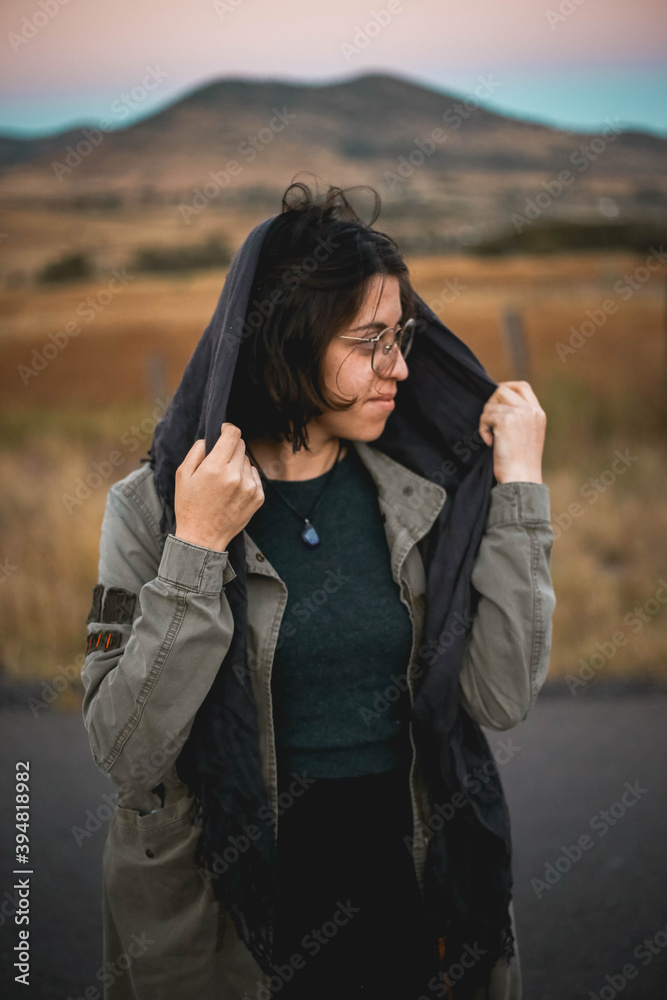 portrait of a young woman traveler, mexican woman, mountains