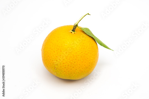 Orange fruit with leaves isolated on white background. Сopy space on a white background	