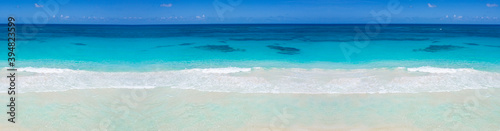 Wild tropical seashore with turquoise caribbean sea. Long banner