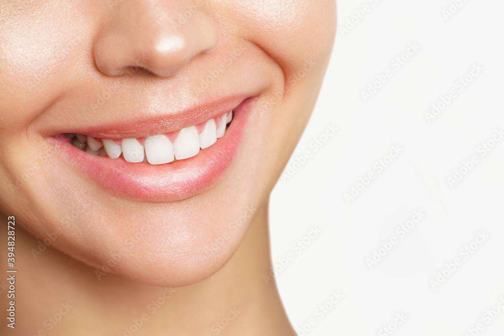Beautiful young woman with healthy teeth on white background. Beautiful young woman with healthy teeth on white background.