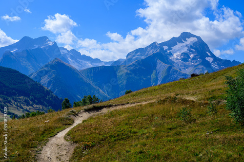 Wallpaper Mural Hiking near ski station Les deux Alpes and view on Alpine mountains peaks in summer, Isere, France Torontodigital.ca