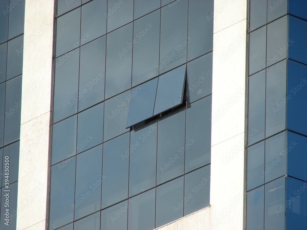 Skyscraper reflective glass close up shot Skyscraper reflective glass close up shot