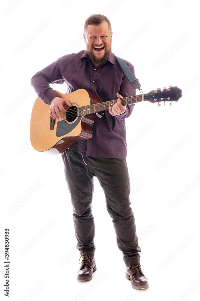 Mature musician plays acoustic guitar emotional studio portrait on white background. Mature musician plays acoustic guitar emotional studio portrait on white background.