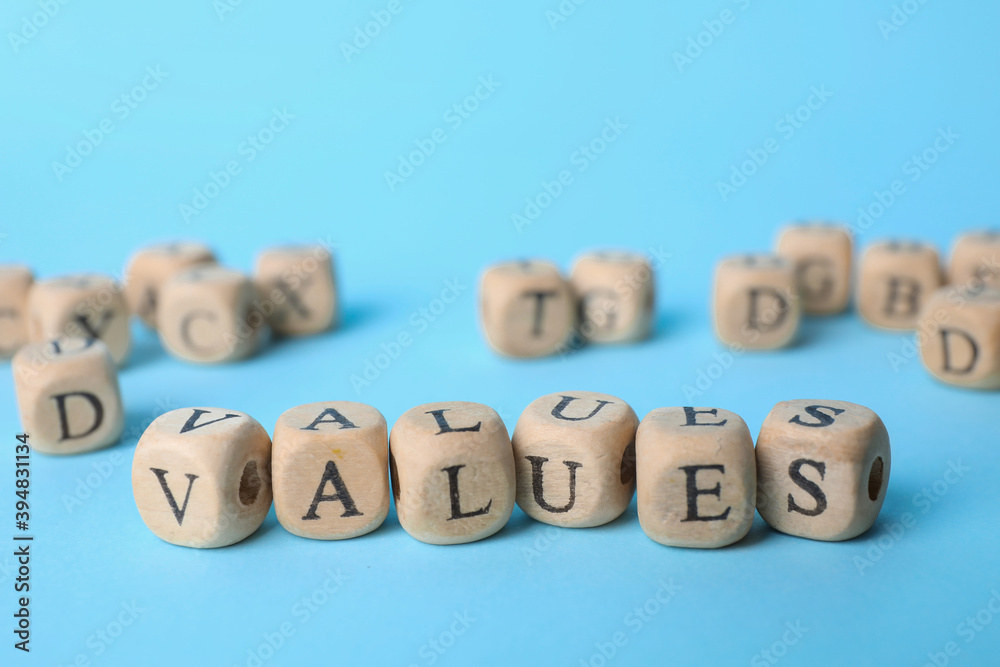 Beads with word VALUES on light blue background Beads with word VALUES on light blue background