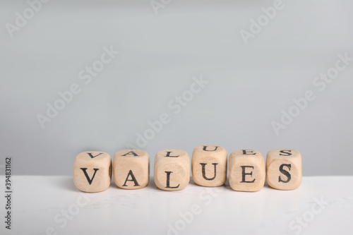 Wallpaper Mural Beads with word VALUES on white table Torontodigital.ca