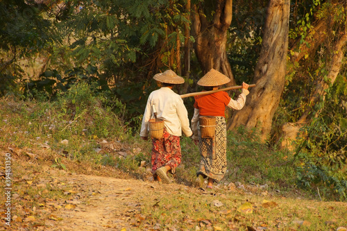 Local village farmers return home photo