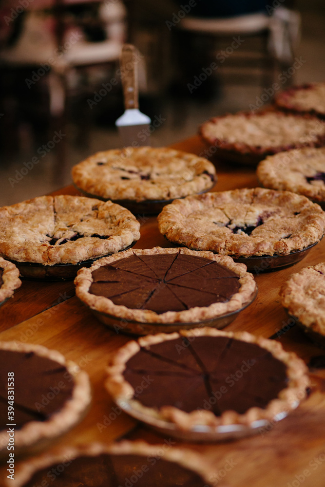 Fototapeta premium Assortment of pies on wooden table