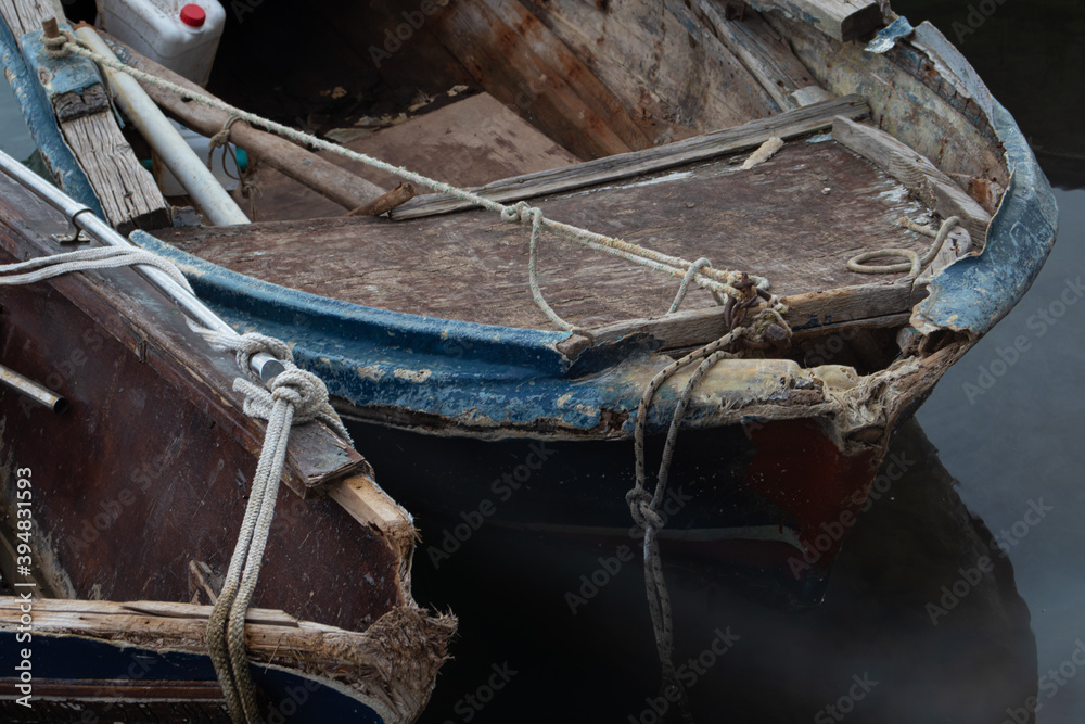 Abandoned wooden boats at Pireaus