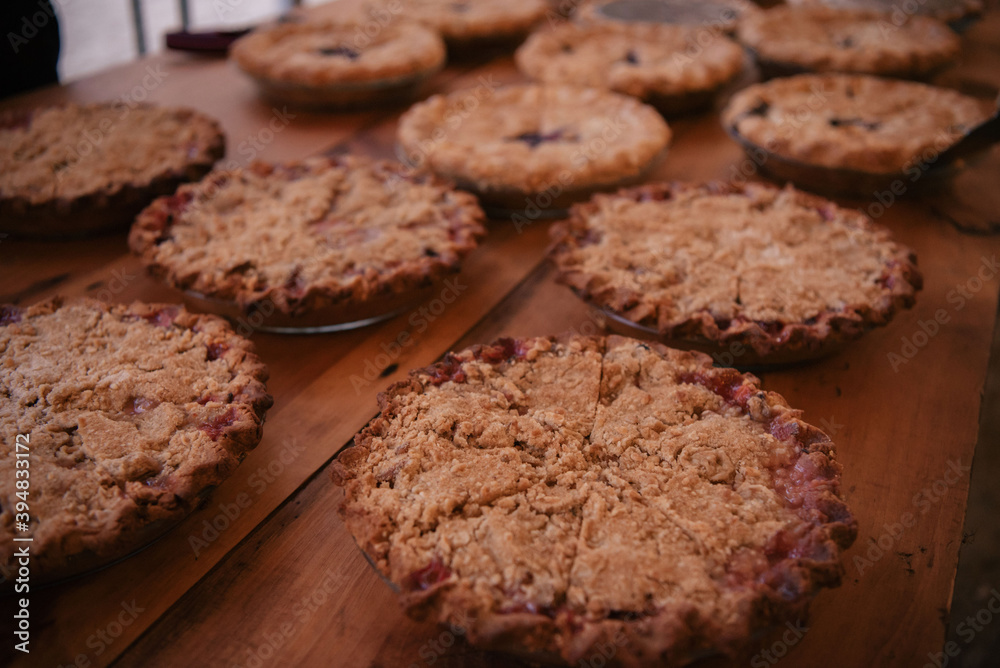 Assortment of pies on wooden table Assortment of pies on wooden table