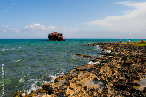 Abandoned boat on the San Andres island. San Andres Archipelago, Providencia and Santa Catalina, Colombia. photo