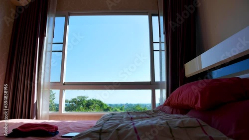 4K Timelapse Video of Bed Room with Chiang Mai View at The Window, Thailand.