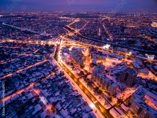Evening aerial view to residential area in Kharkiv with snow
