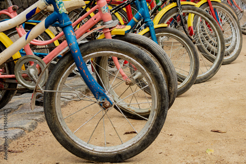 Bicycle front wheels on the dirt floor photo