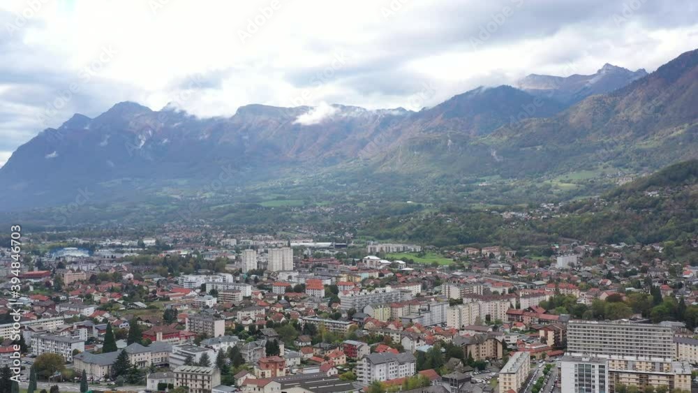 Aerial shot of the pretty old town (Conflans) overlooking Albertville, beautiful view of an old city surrounded by mountains, View of the Conflans, the medieval city located in upper savoy, France Aerial shot of the pretty old town (Conflans) overlooking Albertville, beautiful view of an old city surrounded by mountains, View of the Conflans, the medieval city located in upper savoy, France