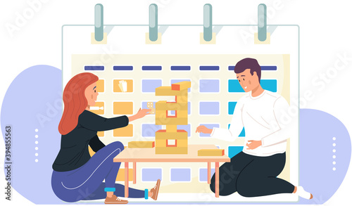 Couple plays at table Jenga Tower. Wooden sticks, whetstones. Development of attention and perseverance. Board game, family fun. Calendar on the background. Guy and girl spend time together at home