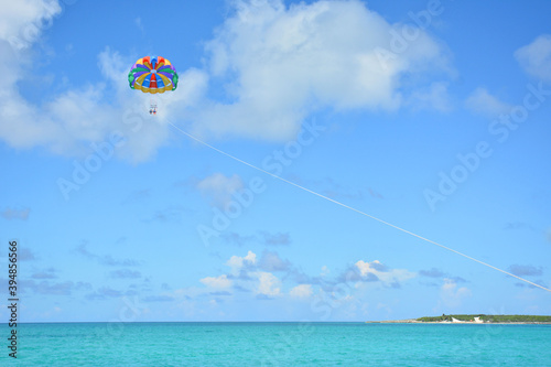 Parasailing with blue skies in the Bahamas