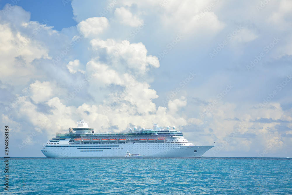 Cruise ship anchored in turquoise waters near the Bahamas in the Caribbean