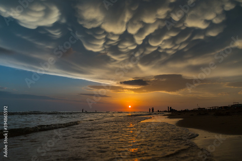 Sunset with beautiful clouds over the seashore