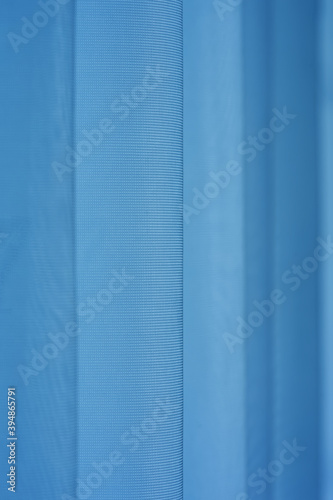 Abstract of fabric texture of blue curtain, selected focus