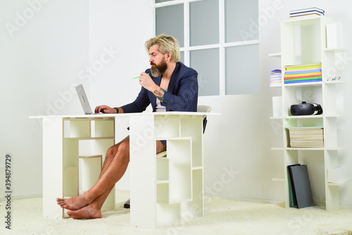 Social distancing. Home is best office. Online education. Freelancer working from home. Man working on laptop at home. Comfortable workplace. Developer work computer. Social networks communication