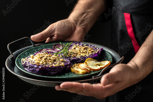 German cuisine. vegetables dish of red cabbage baked with nuts, quince and apples, catering, banner, menu, recipe, place for text