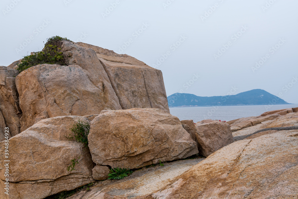 Rocks and beach in the Putuoshan, Zhoushan Islands,  a renowned site in Chinese bodhimanda of the bodhisattva Avalokitesvara (Guanyin)