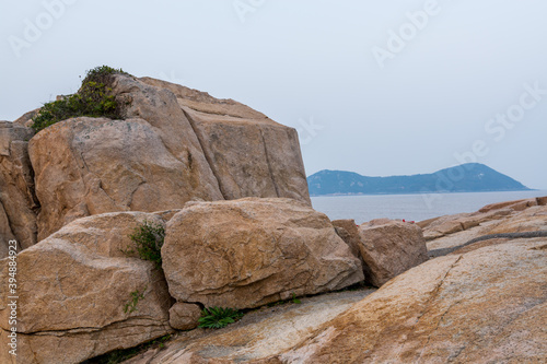 Rocks and beach in the Putuoshan, Zhoushan Islands,  a renowned site in Chinese bodhimanda of the bodhisattva Avalokitesvara (Guanyin) © zz3701