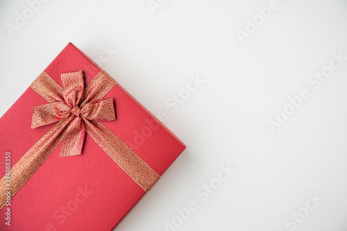 Gift box mockup on the white table with copy space. Merry christmas and happy new years background for text advertise.