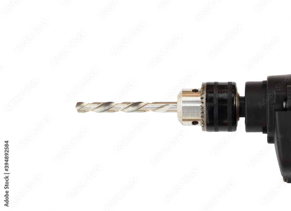Drill-screwdriver with drills and nozzle isolated on white background Drill-screwdriver with drills and nozzle isolated on white background