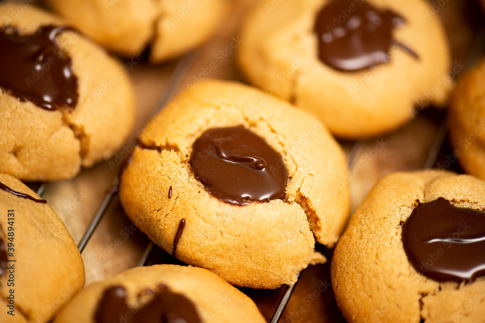 Chocolate nut biscuits being prepared for baking, food background.