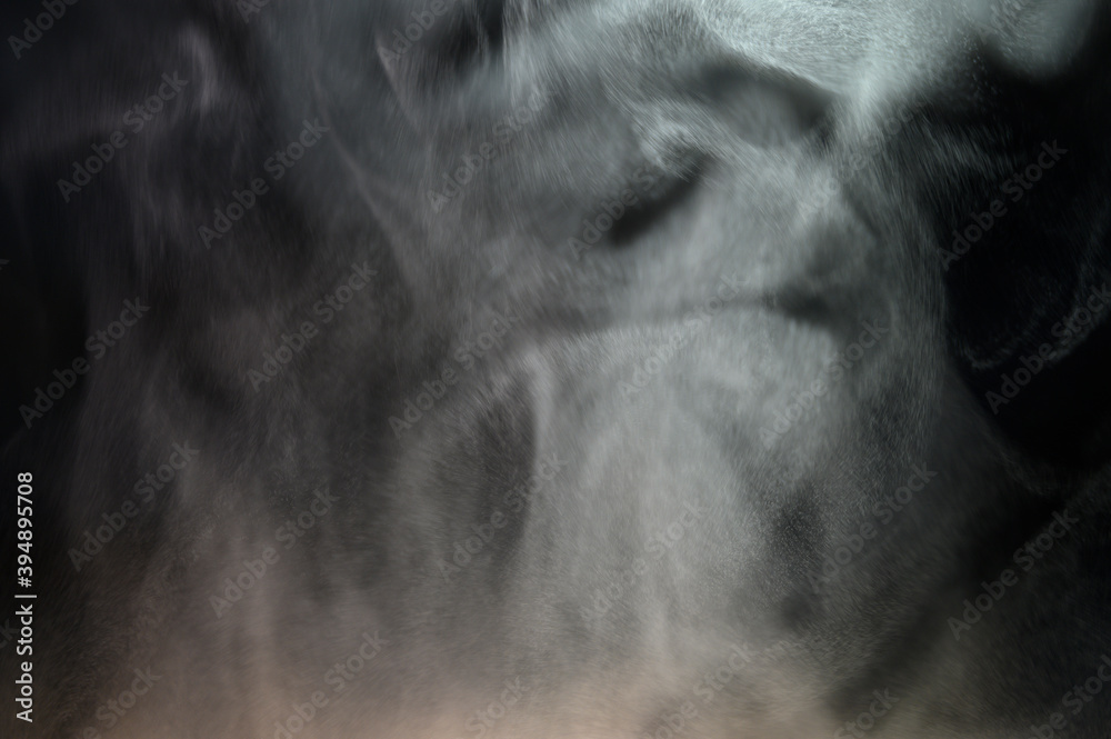 Grey smoke on a black background, fog on a dark background Grey smoke on a black background, fog on a dark background