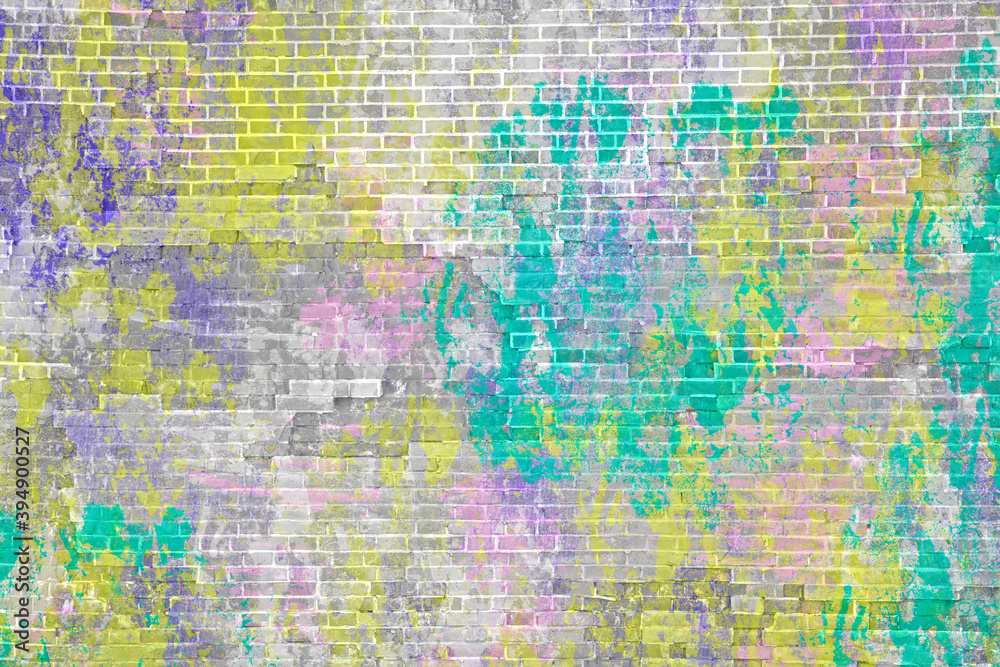 Multi-colored brick wall. Bright green, purple, yellow paint on brick texture.