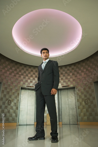 Indian businessman in office lobby