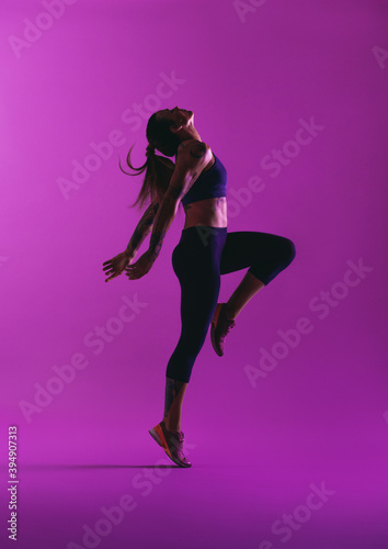 Fit woman doing stretching workout