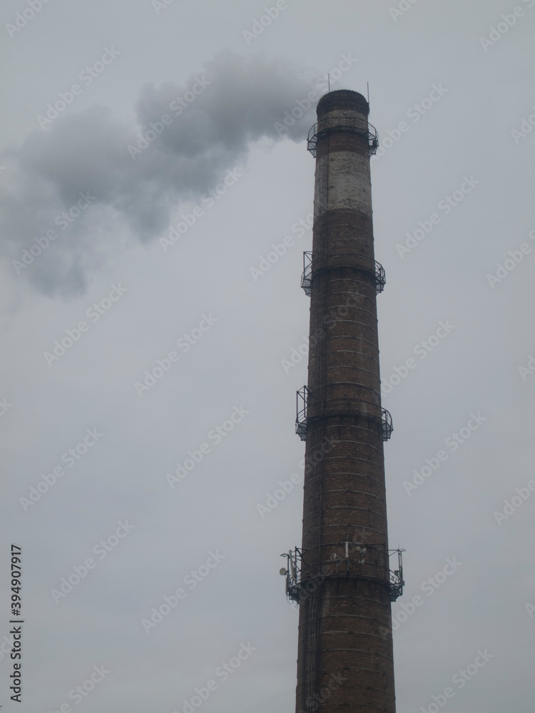 smoke over the chimney of the plant