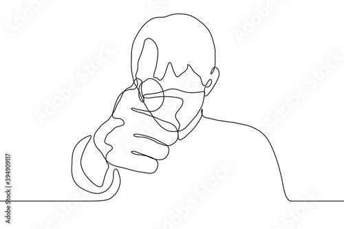 young man in a mask points his index finger at the viewer / wearer. one line drawing concept of pointer, detection, target found