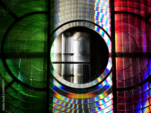 Colourful fresnel glass lens in a lighthouse - UK