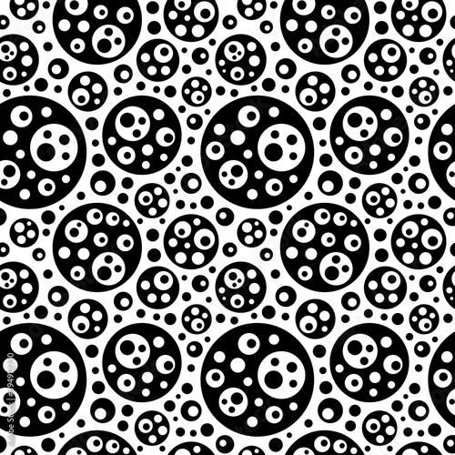 Seamless pattern. Black and white circles of different sizes.