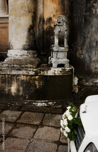 Wedding car parked outside of front entrance of San Agustin Church - Philippines photo