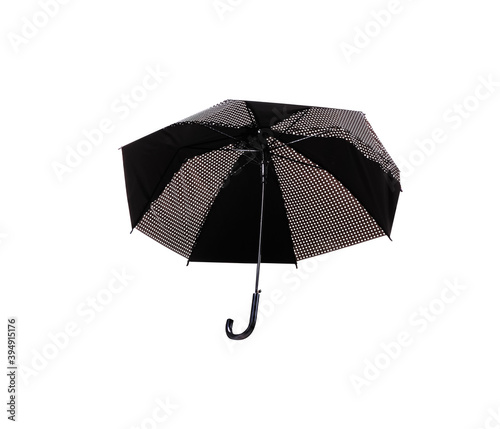 Umbrella with black and white patterns open isolated on white background , clipping path