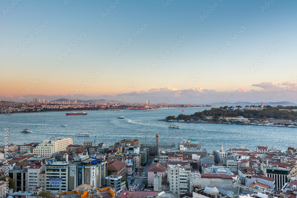 Aerial view of golden horn in the strait of Bosporus under sunset from the gala tower in Istanbul, Turkey, view from the Galata tower.