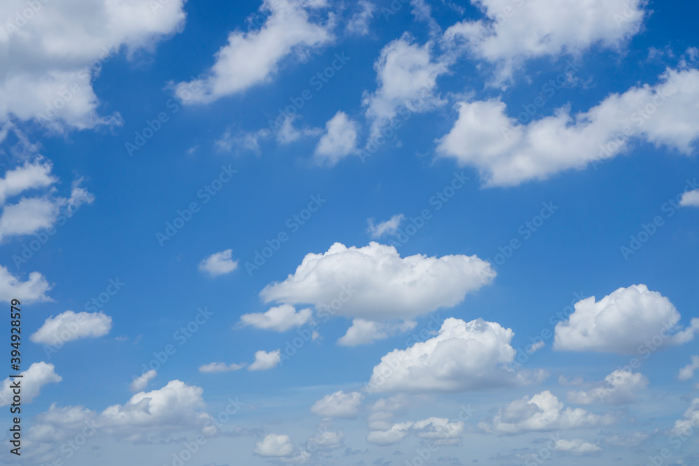 Beautiful white fluffy clouds on vivid blue sky in a suny day Beautiful white fluffy clouds on vivid blue sky in a suny day