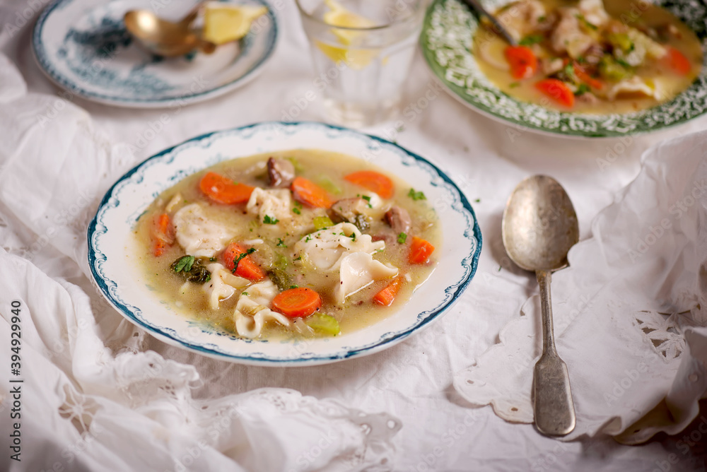 Warsaw pierogi soup.. Traditional Polish dish..style rustic. Warsaw pierogi soup.. Traditional Polish dish..style rustic.