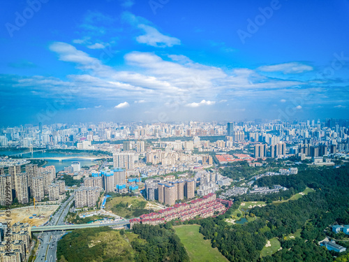 Landscape of high-rise city along the river in Nanning, Guangxi, China © Steve