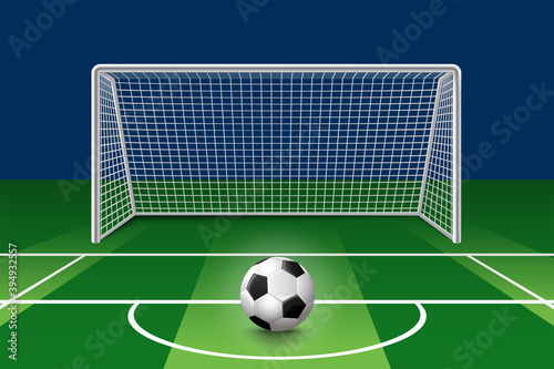 Soccer ball on field front of goal