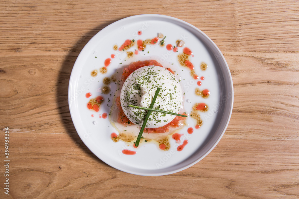 Fresh soft white burrata, ball buttery cheese Fresh soft white burrata, ball buttery cheese