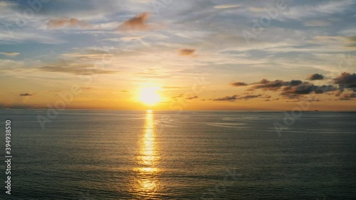 4K Phuket Thailand beautiful tropical beach with sunset sky. Beautiful Phuket beach is famous tourist destination at Andaman sea summer concept. New normal after covid-19